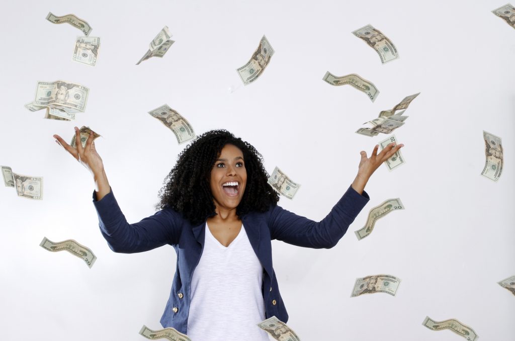 woman throwing money in the air 360 Federal Credit Union